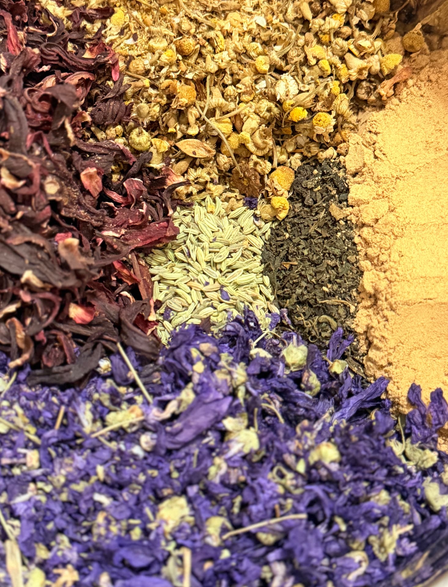 Dried hibiscus, chamomile, fennel and mallow herbs for our postpartum blends