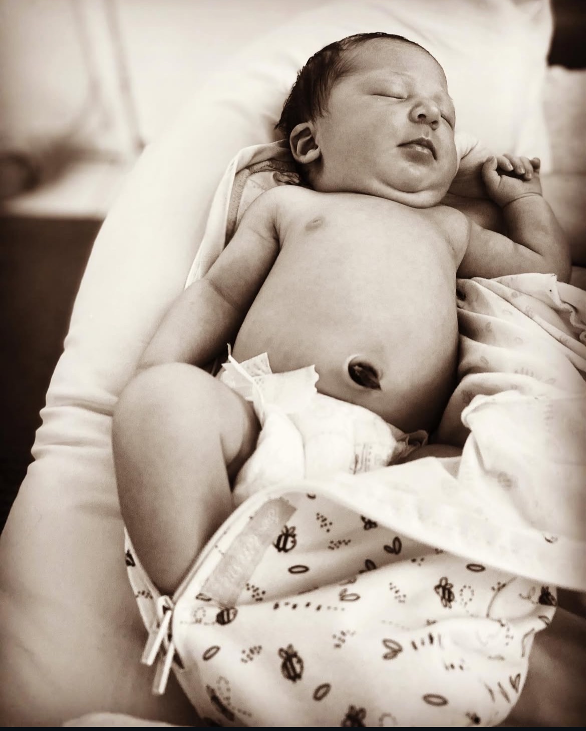 Sleeping newborn, black and white